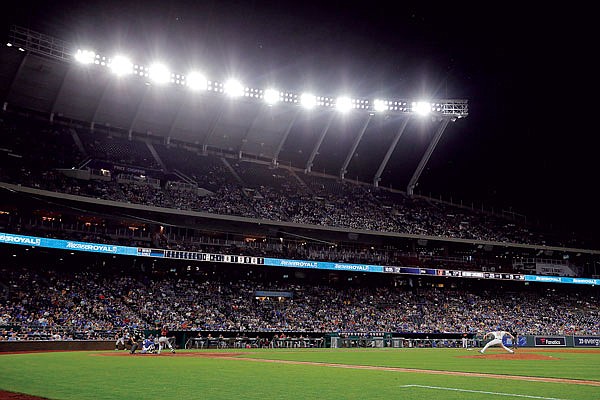 In this July 16 file photo. the Royals and Orioles play under the lights of Kauffman Stadium.