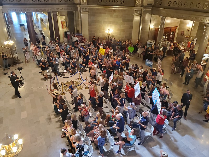 State Sen. Bill Eigel, R-St. Charles, addresses rally goers Wednesday in the Capitol Rotunda. Eigel encouraged the crowd to help him and other lawmakers convince Gov. Mike Parson to get legislation passed to block the federal COVID vaccine mandate announced last week by President Joe Biden. (Photo Jeff Haldiman)