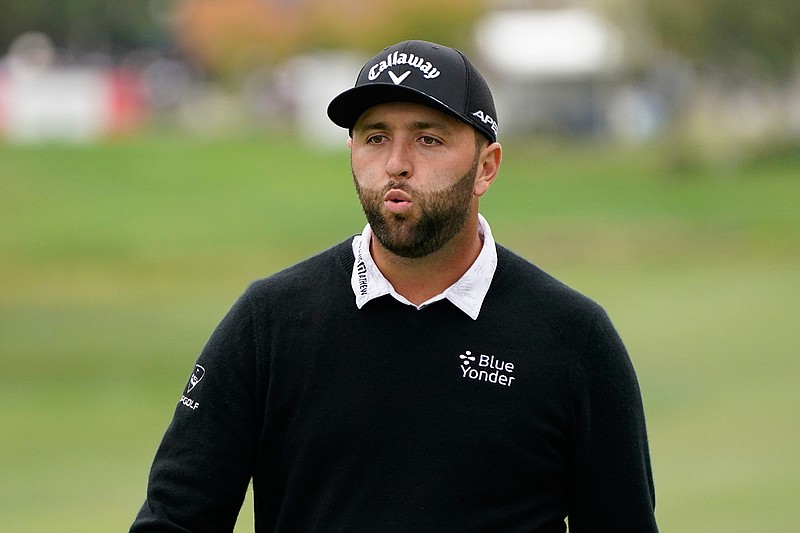 Jon Rahm, of Spain, reacts after putting the ball close to the first hole of the Silverado Resort North Course during the first round of the Fortinet Championship PGA golf tournament, Thursday, Sept. 16, 2021, in Napa, Calif. (AP Photo/Eric Risberg)