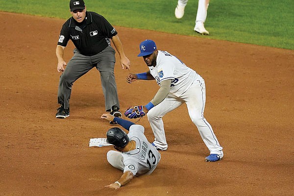 Royals third baseman Hanser Alberto gets the second out of a double play, forcing Abraham Toro of the Mariners at second during Friday night's game at Kauffman Stadium.