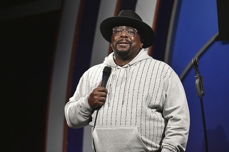 FILE - Cedric the Entertainer performs during "Stand Up for Haiti" comedy fundraiser in Los Angeles on Aug. 30, 2021. The comedian and actor will host Sunday’s Emmy ceremony, airing on CBS. (Photo by Richard Shotwell/Invision/AP, File)