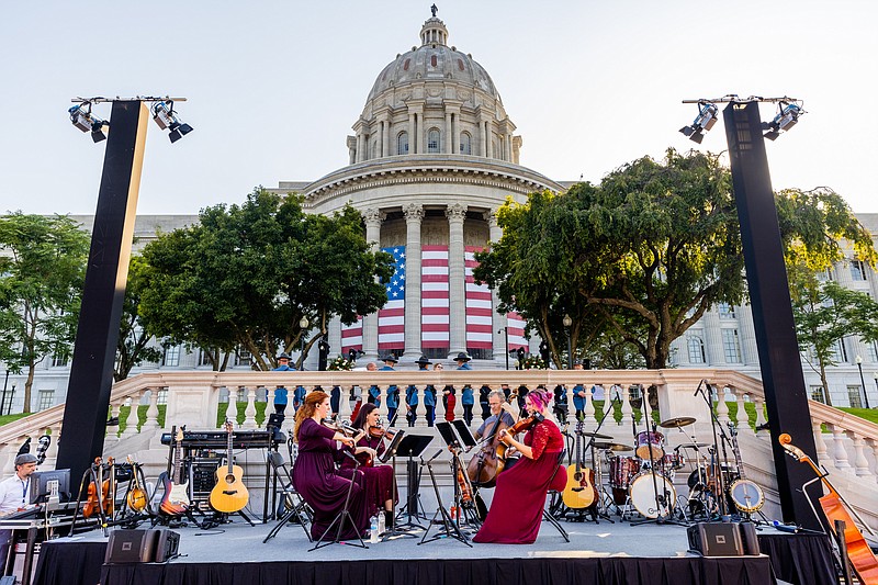 Ethan Weston/News Tribune The Duttons play music for guests at the Bicentennial Inaugural Ball on Saturday, September 18, 2021 in Jefferson City, Mo. The Duttons are a family of multigenerational musical performers who appear regularly in Branson, Mo.