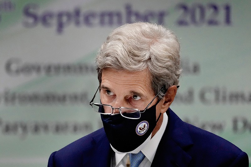 In this Sept. 13, 2021 photo, U.S. Special Presidential Envoy for Climate John Kerry listens to a speech at the launch of Climate Action and Finance Mobilisation Dialogue (CAFMD) under India-US Agenda 2030 Partnership in New Delhi, India. Kerry's quest to stave off the worst scenarios of global warming is meeting resistance from China, the world's biggest climate polluter, which is adamant that the United States ease confrontation over other matters if it wants Beijing to speed up its climate efforts. (AP Photo/Manish Swarup)