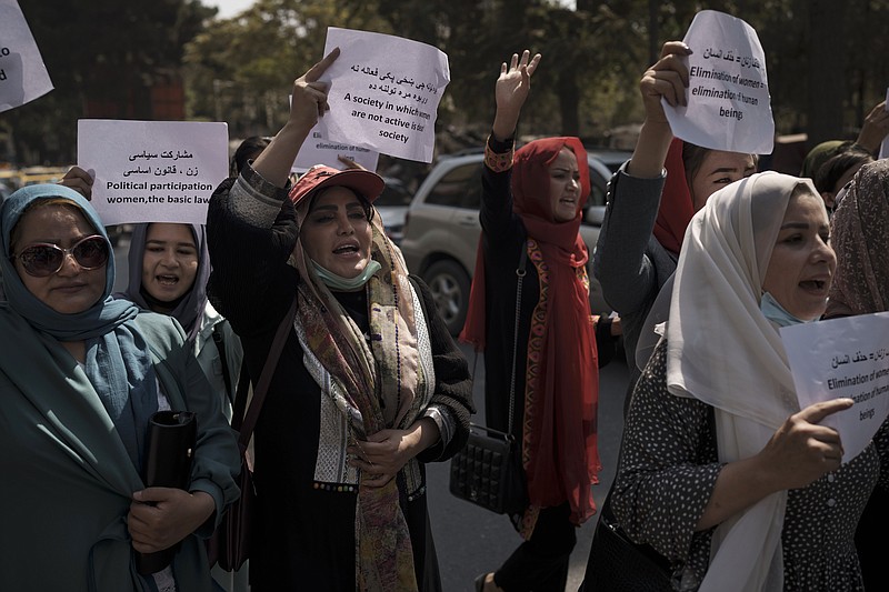 <p>Women march to demand their rights under the Taliban rule during a demonstration near the former Women’s Affairs Ministry building in Kabul, Afghanistan, Sunday, Sept. 19, 2021. The interim mayor of Afghanistan’s capital said Sunday that many female city employees have been ordered to stay home by the country’s new Taliban rulers. (AP Photo)</p>