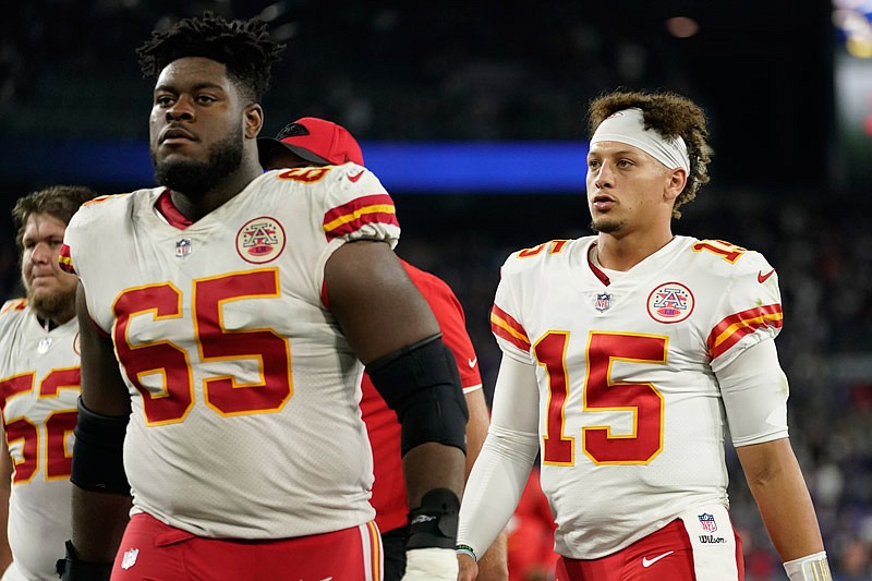 Kansas City Chiefs quarterback Patrick Mahomes (15) walks off the field after an NFL football game against the Baltimore Ravens, Sunday, Sept. 19, 2021, in Baltimore. Baltimore won 36-35. (AP Photo/Julio Cortez)