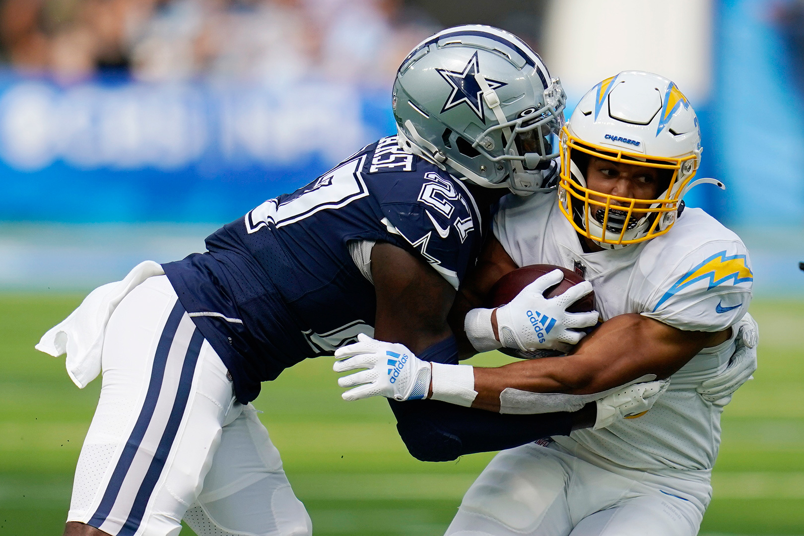 The Latest: Cowboys-Chargers make NFL 14-11 halftime history