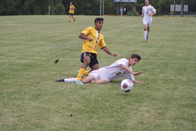 Junior Bahir Sherzad has a ball deflected away Tuesday in the first half of Fulton's 3-0 win against Kirksville by a defender. Head coach Joel Henley said the Hornets were playing slow in the first half and were having their passes well-defended as a result.