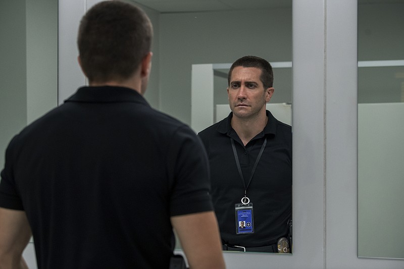 This image released by Netflix shows Jake Gyllenhaal in a scene from "The Guilty." (Netflix via AP)
