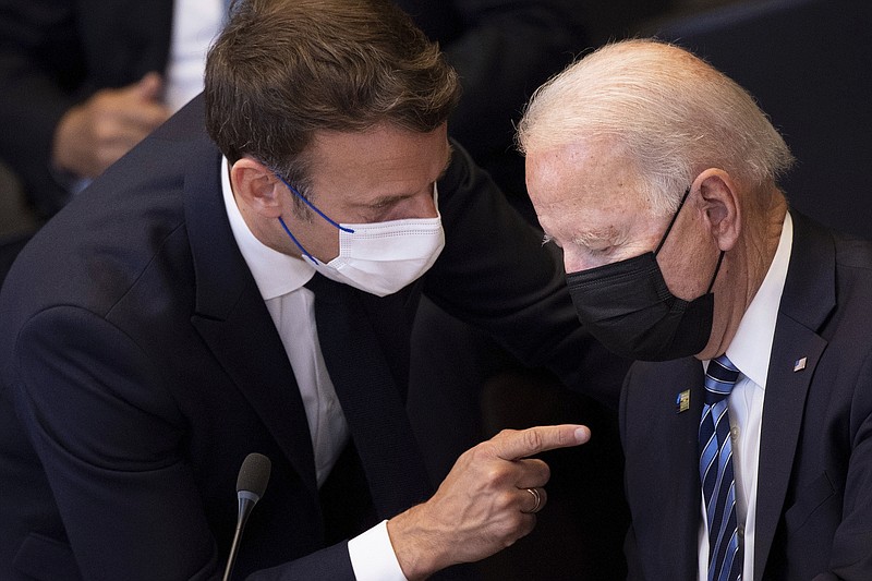 <p>Brendan Smialowski, Pool via AP, File</p><p>In this June 14, 2021 file photo, U.S. President Joe Biden, right, speaks with French President Emmanuel Macron during a plenary session during a NATO summit at NATO headquarters in Brussels. French President Emmanuel Macron expects “clarifications and clear commitments” from President Joe Biden in a call to be held later on Wednesday to address the submarines’ dispute, Macron’s office said.</p>