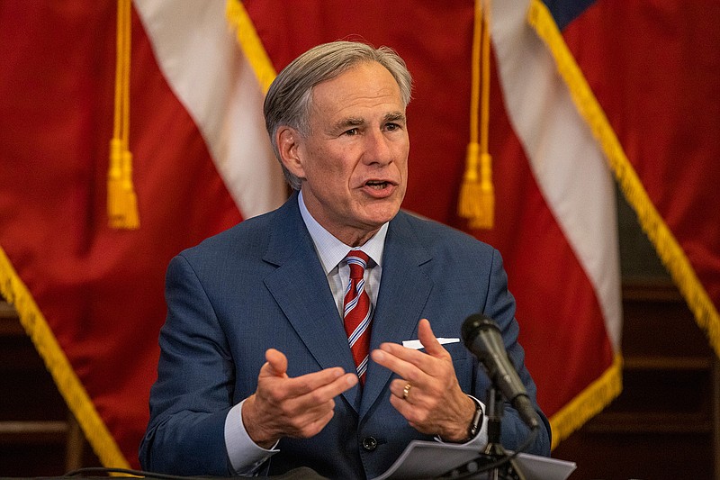 Texas Gov. Greg Abbott announces the reopening of more Texas businesses during the COVID-19 pandemic at a press conference at the Texas State Capitol on May 18, 2020 in Austin, Texas. (Lynda M. Gonzalez/Pool/Getty Images/TNS)