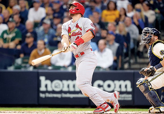 Paul Goldschmidt of the Cardinals watches his two-run home run during the seventh inning of Thursday afternoon's game against the Brewers in Milwaukee.