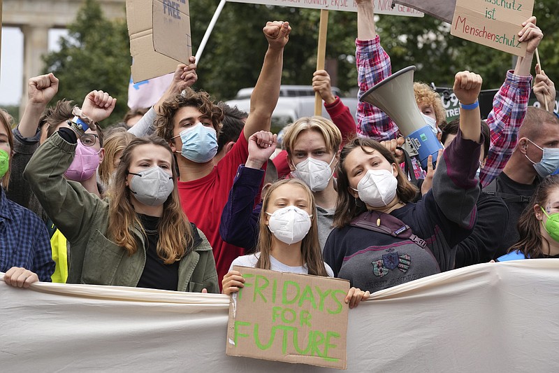 Swedish climate activist Greta Thunberg joins a Fridays for Future global climate strike in Berlin, Germany, Friday, Sept. 24, 2021. (AP Photo/Michael Sohn)