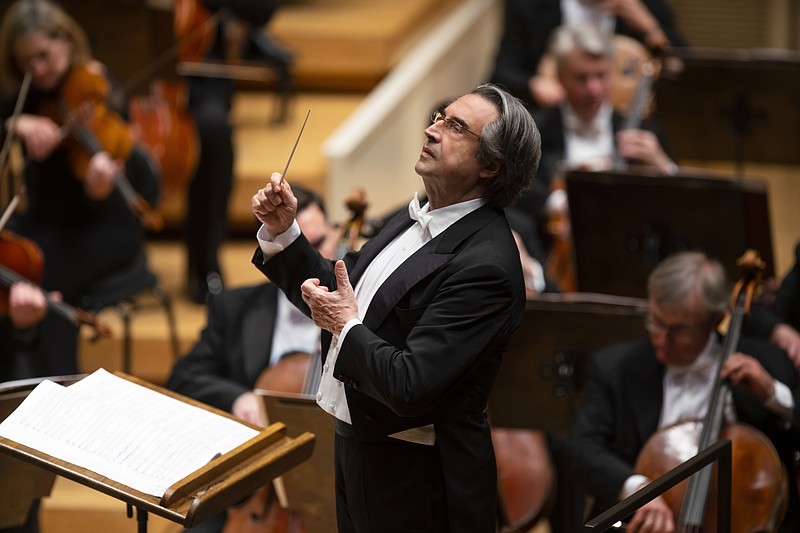 This image released by Chicago Symphony Orchestra shows music director Riccardo Muti conducting the Chicago Symphony Orchestra on May 9, 2019 in Chicago. Muti has extended his contract as music director of the Chicago Symphony Orchestra by one year through the 2022-23 season. The 80-year-old Italian became music director of the CSO in 2010, succeeding Daniel Barenboim. (Todd Rosenberg/Chicago Symphony Orchestra via AP)