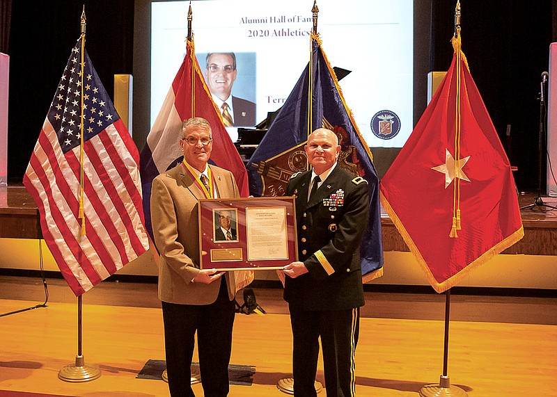 Terry Logue, left, was inducted Sept. 18 into the Missouri Military Academy Alumni Hall of Fame for lifetime achievement in athletics on the Academy campus in Mexico, Missouri.