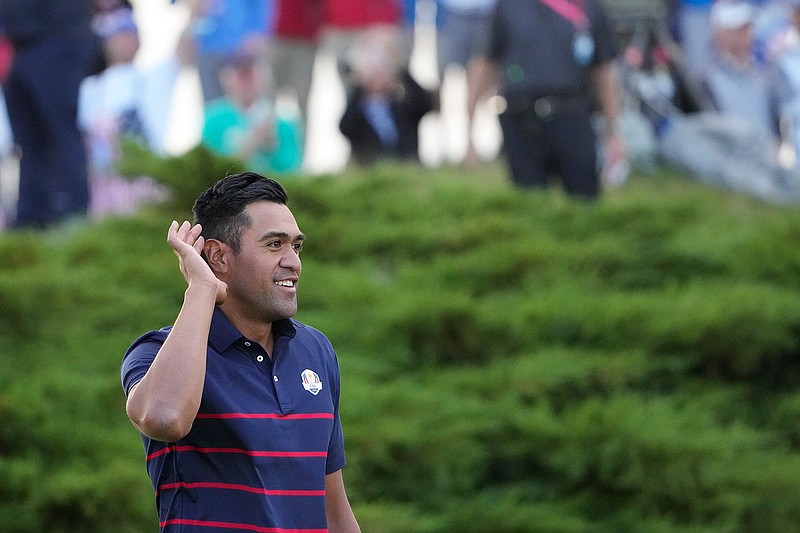 Team USA's Tony Finau reacts after winning a four-ball match the Ryder Cup at the Whistling Straits Golf Course Friday, Sept. 24, 2021, in Sheboygan, Wis. (AP Photo/Jeff Roberson)