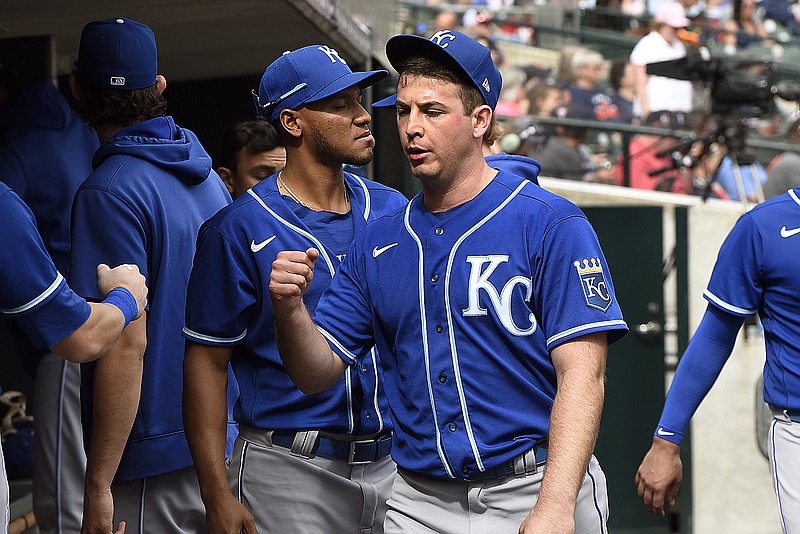 Royals starting pitcher Kris Bubic is congratulated in the dugout after the final out of the seventh inning of Sunday's game against the Tigers in Detroit.