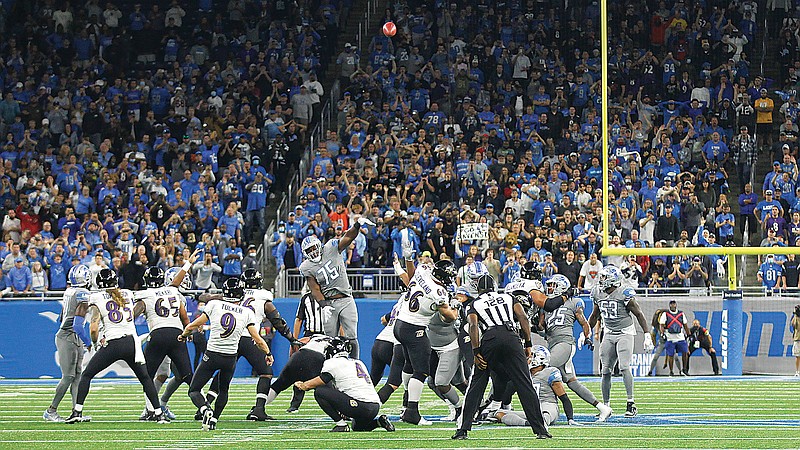 Ravens kicker Justin Tucker (9) watches after he kicks a 66-yard field goal in the closing seconds of the second half of Sunday's game against the Lions in Detroit. The kick was good, breaking an NFL record, and the Ravens won 19-17.