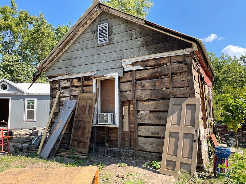 Democrat photo/Kaden Quinn While attempting to dismantle her home to obtain usable materials for other construction projects, owner Jane Suggs made a surprising discovery — there was a log cabin dating back to the 19th century buried within the walls of her home.