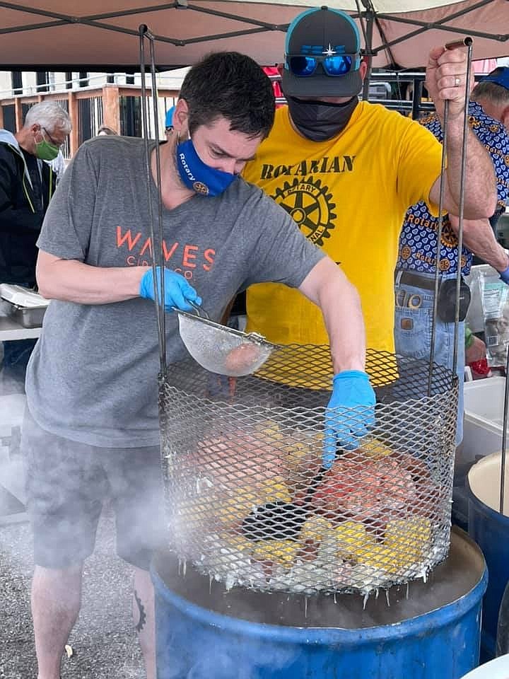 <p>Submitted </p><p>Members of the Columbia Rotary Club cook up a Low Country Boil in May. They will come to Fulton to cook for Fulton Rotary Oct. 24.</p>