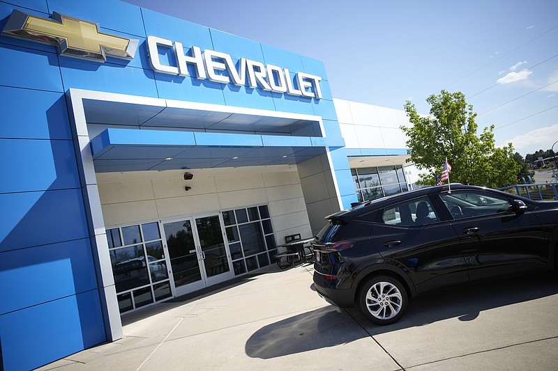 <p>AP File</p><p>A par of unsold 2022 Bolt electric vehicles sit Sept. 12 outside a Chevrolet dealership in Englewood, Colorado. U.S. new vehicle sales tumbled in September as a global shortage of computer chips worsened, shuttering factories and limiting the selection on dealer lots.</p>