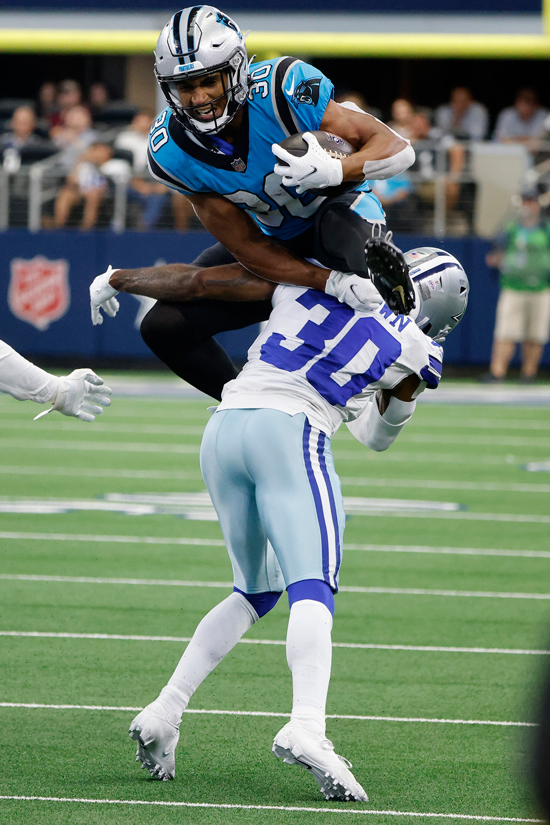 Elliott, Cowboys ride herd on Panthers