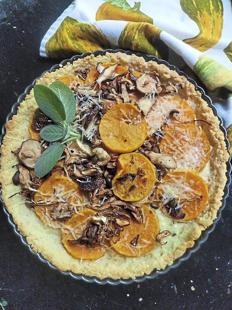Wild mushrooms team and roasted butternut squash adds fall flavors to this tart with a homemade cheddar crust. (Gretchen McKay/Pittsburgh Post-Gazette/TNS)