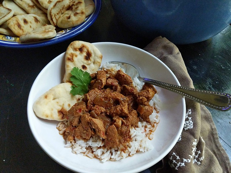 "Vindaloo" usually conjures up a searingly hot curry, but this recipe is relatively mild. It's  made with pork butt and dried guajillo chiles. (Gretchen McKay/Pittsburgh Post-Gazette/TNS)