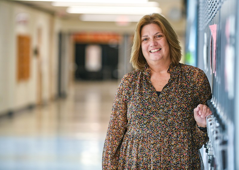 Meg McGhghy poses in this October 2021 photo at Jefferson City High School, where she is an English teacher. (Julie Smith/News Tribune photo)