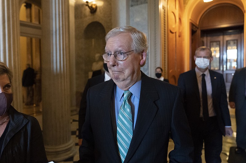<p>AP</p><p>Senate Minority Leader Mitch McConnell, of Kentucky, walks to a policy luncheon Thursday on Capitol Hill in Washington.</p>