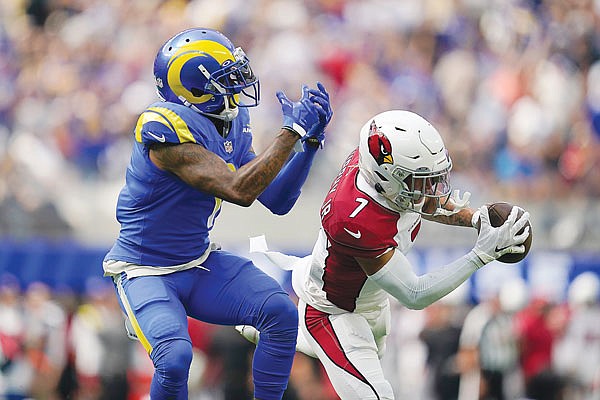 Cardinals cornerback Byron Murphy intercepts a pass intended for Rams wide receiver DeSean Jackson during last Sunday's game in Inglewood, Calif.