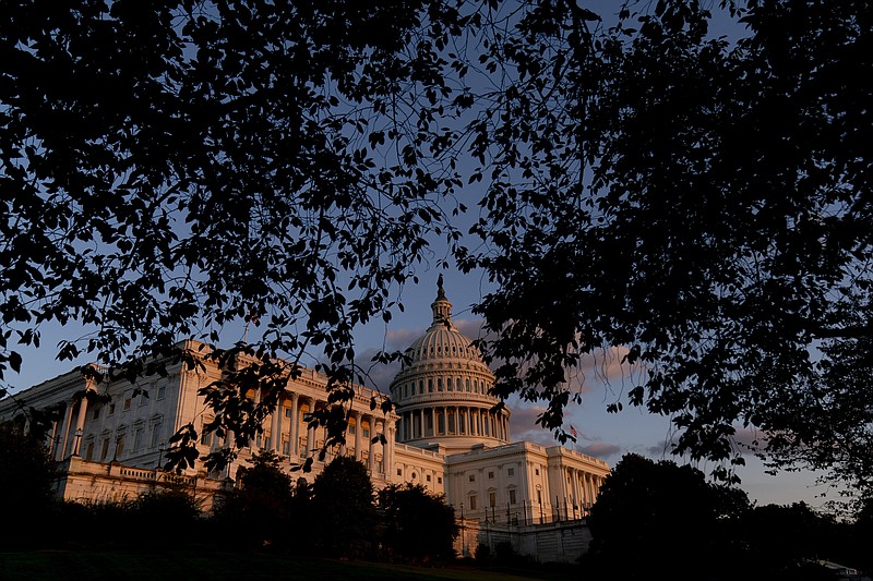 <p>AP File</p><p>The U.S. Capitol at sunset on Sept. 30 in Washington, D.C. Year-end pileups of crucial legislation and the brinkmanship that goes with it are annual rituals for Congress. But this time, testy lawmakers are barreling toward an autumn of battles that are striking for the risks they pose to both parties and their leaders. Miscalculate and there could be a calamitous federal default, a collapse of President Joe Biden’s domestic agenda and, for good measure, a damaging government shutdown.</p>