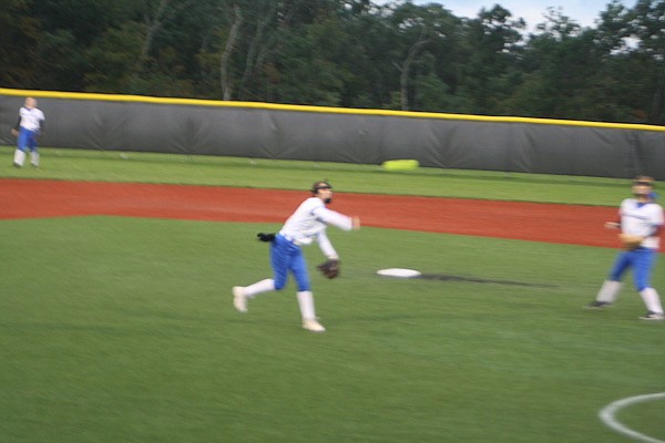 Junior shortstop Abbi Patrick makes a throw home Monday in the first inning of South Callaway's 17-7 win at home against Van-Far. The throw caused a forceout at home and prevented a run from scoring before the Lady Bulldogs put together their first of two of six-run innings.