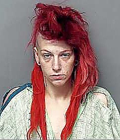JC woman charged after running naked onto football field | Jefferson