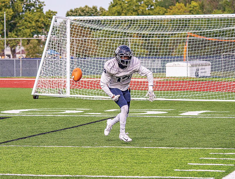 Lincoln's Piere' Jones celebrates after intercepting a Missouri Southern pass in the end zone during last Saturday's game at Dwight T. Reed Stadium.