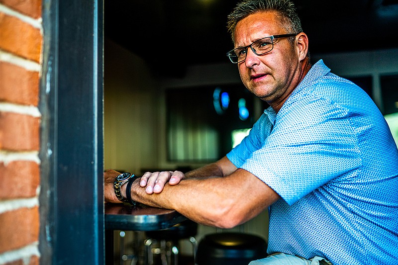 Scot Drinkard owns Spectators Sports Bar, which will be closing on January, 1 2022. Drinkard plans to redesign the bar into more of a cozy “speakeasy” type lounge. (Ethan Weston/News Tribune)