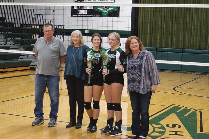 North Callaway seniors Hannah Cundiff (14) and Jenny Selby (13) were honored Tuesday before varsity's match with Wright City, which the Ladybirds lost in four sets. The pair were among the team leaders in service aces and led the effort in the team's first-set victory.