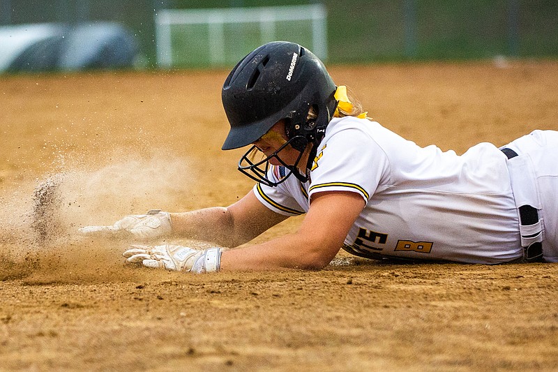 Fulton's Alex Trowbridge dives as she returns to third base after an aborted attempt to run home during Wednesday's Class 3 state quarterfinal game against Blair Oaks at the Falcon Athletic Complex in Wardsville.