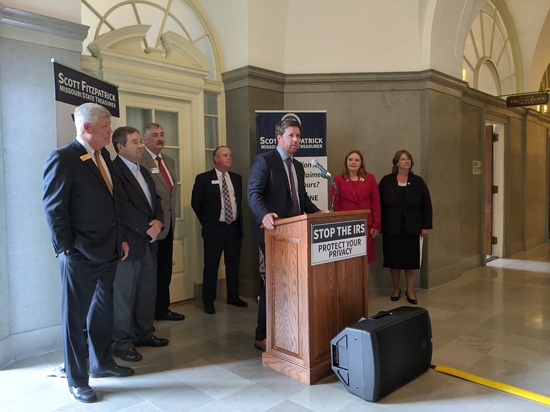 State Treasurer Scott Fitzpatrick is joined by state representatives and financial industry leaders Thursday in opposing the IRS reporting plan working through Congress. Fitzpatrick says he won't comply if the proposal becomes law. Photo by Ryan Pivoney 