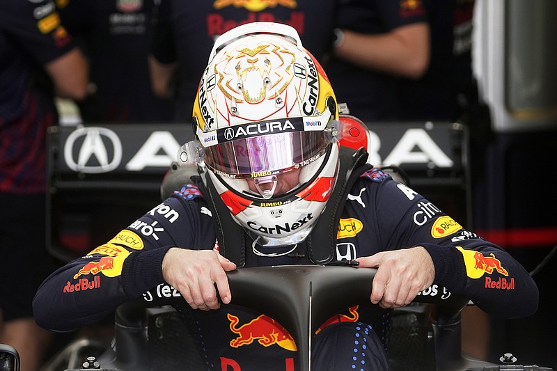 Red Bull driver Max Verstappen climbs into his car during Saturday's practice session for the Formula One U.S. Grand Prix at the Circuit of the Americas in Austin, Texas.