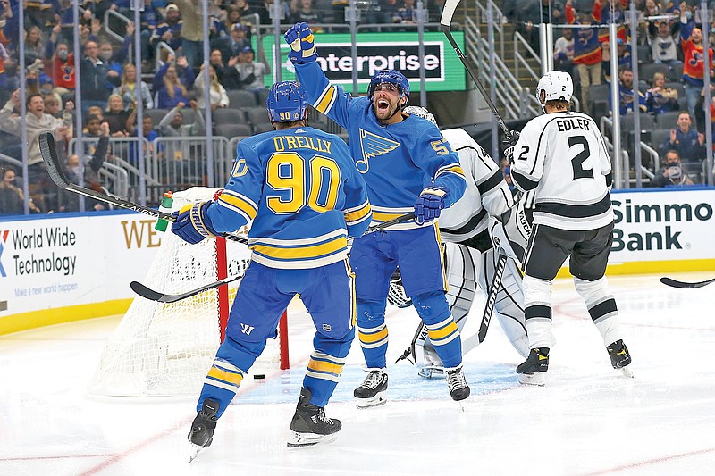 David Perron (right) reacts after scoring a goal during the second period of Saturday night's game against the Kings in St. Louis.