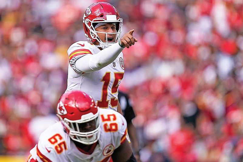 Chiefs quarterback Patrick Mahomes points down field during last week's game against the Washington Football Team in Landover, Md.