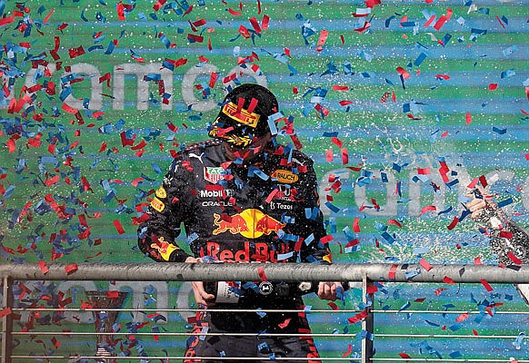 Max Verstappen celebrates Sunday after winning the Formula One U.S. Grand Prix race at Circuit of the Americas in Austin, Texas.