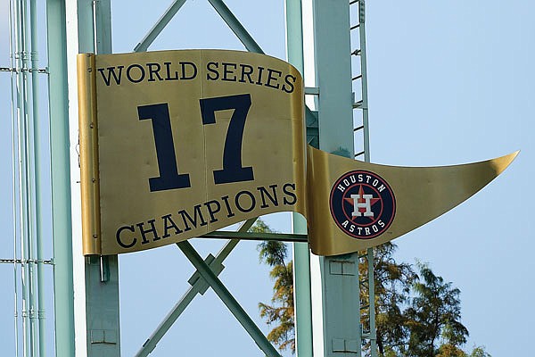 The Houston Astros World Series banner is seen Monday in Houston. The Astros host the Braves tonight in Game 1 of the World Series.