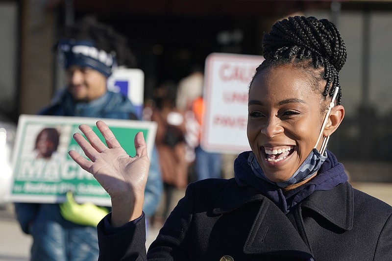 Democratic candidate Shontel Brown waves to voters at the Bedford community Center, Tuesday, Nov. 2, 2021, in Bedford Heights, Ohio. Brown is running for Ohio's 11th Congressional District. (AP Photo/Tony Dejak)