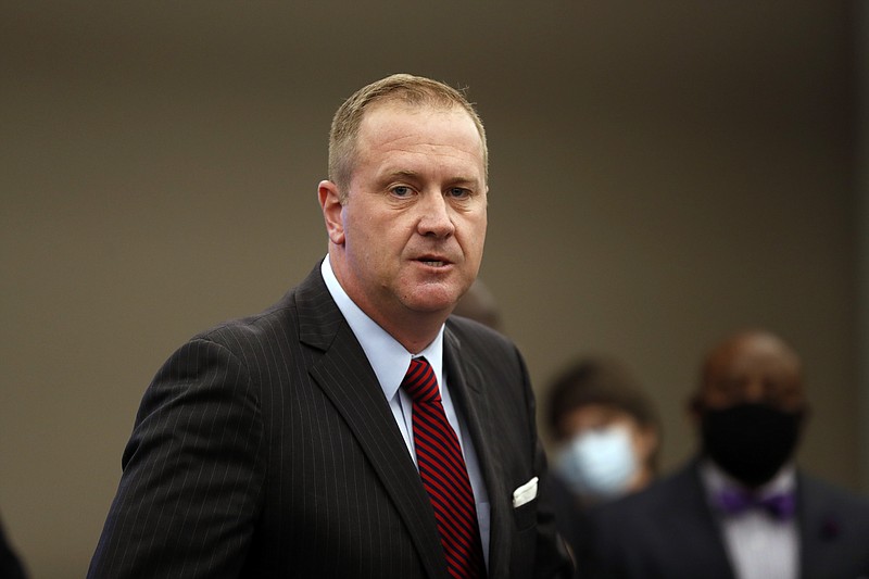 FILE - Missouri Attorney General Eric Schmitt speaks during a news conference in St. Louis on Aug. 6, 2020. Missouri's Republican attorney general and U.S. Senate candidate Schmitt is considering possible criminal charges for GOP state Rep. Chad Perkins, accused of having sex with a drunk woman while on duty as a cop years ago. Schmitt's office confirmed Thursday, Nov. 4, 2021, that a local judge appointed him special prosecutor to review the case against GOP state Rep. Perkins. (AP Photo/Jeff Roberson, File)