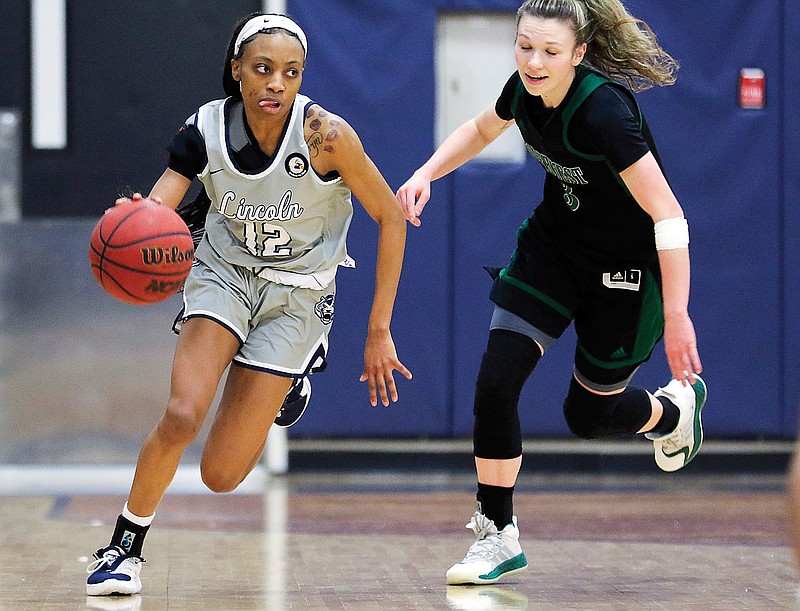 Lincoln guard Niyah Jackson drives up the court during a game last season against Northwest Missouri State at Jason Gym.