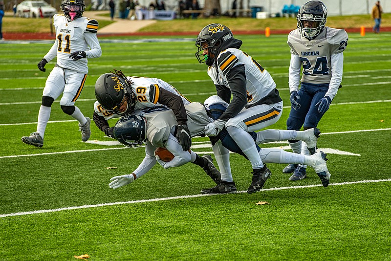 Lincoln's Chrisshun Robinson gets taken down during Saturday's game against Missouri Western at Dwight T. Reed Stadium.