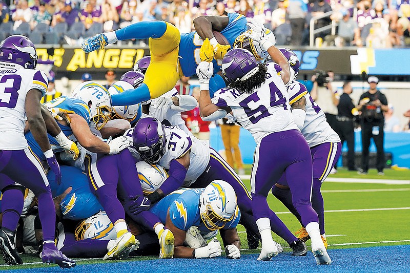 Chargers running back Larry Rountree III dives across the goal line for a touchdown during Sunday's game against the Vikings in Inglewood, Calif.