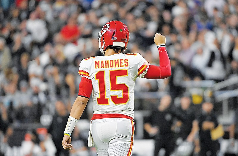 Chiefs quarterback Patrick Mahomes motions during the first half of Sunday night's game against the Raiders in Las Vegas.