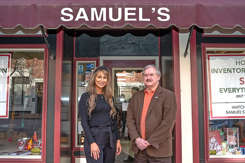 <p>Ethan Weston/News Tribune</p><p>Hannah Spalding and Sam Bushman pose Friday at Samuel’s Tuxedos and Gifts in Jefferson City. Spalding is taking over for the business from Bushman at the end of the year.</p>